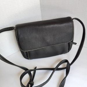 Small leather shoulder purse many compartments. Black leather faux leather trim.